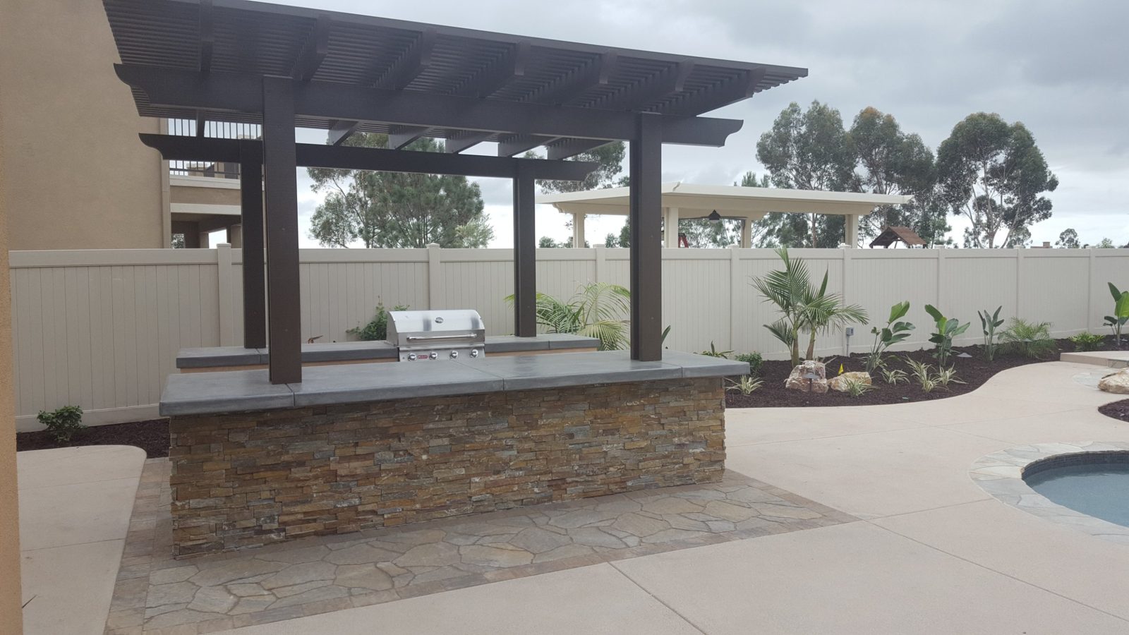 Pergola over a BBQ island