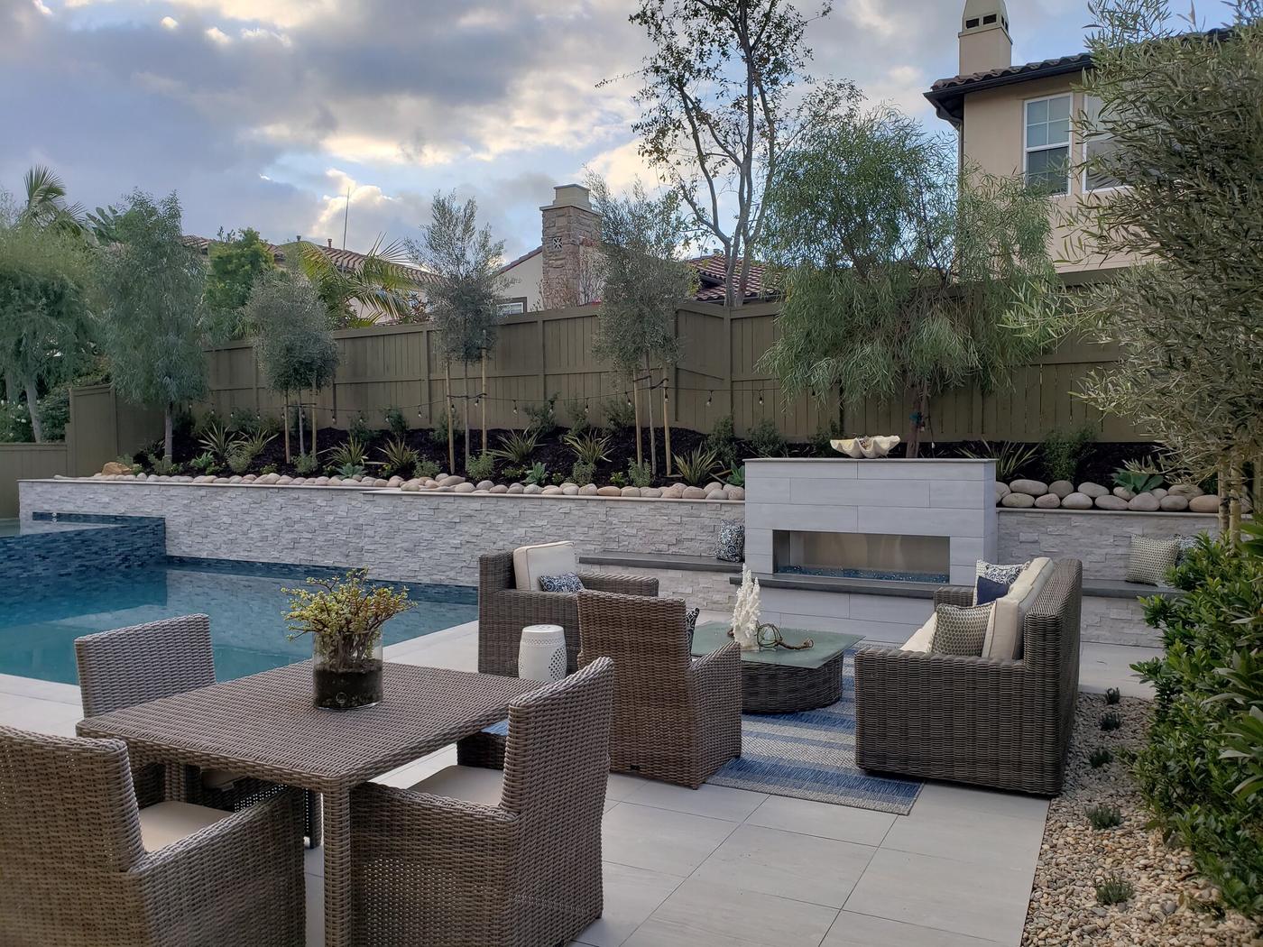 Pool terrace with linear fireplace